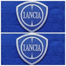 A Pair Of Motor Car Racing