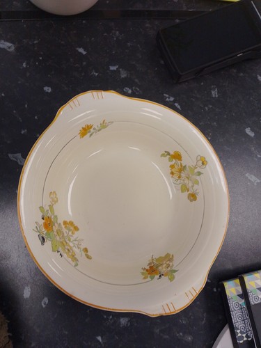 Vintage ceramic piece features