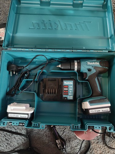 Makita drill with 2 - drill,
