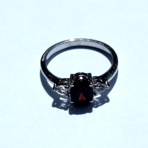 Tocantin garnet white topaz - &,