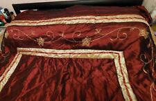 Double burgundy and gold bed throw