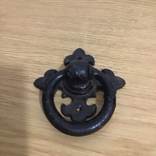 A RECLAIMED CAST IRON DOOR HANDLE