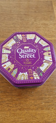 Empty quality street tin - quality,
