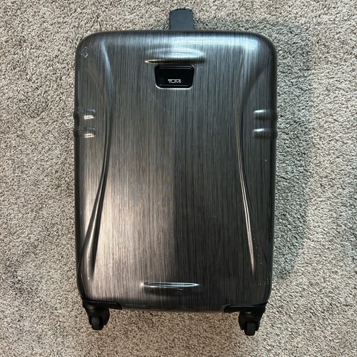 Tumi gray hard shell - tumi,