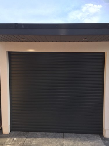Electric roller garage door - garage,