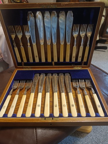 Silver plated and - ivory, fish