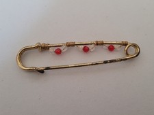 Gold Toned Large Safety Pin Nappy Pin With Clear And Red Bead Decorations