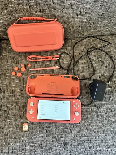 Nintendo switch lite coral - nintendo,