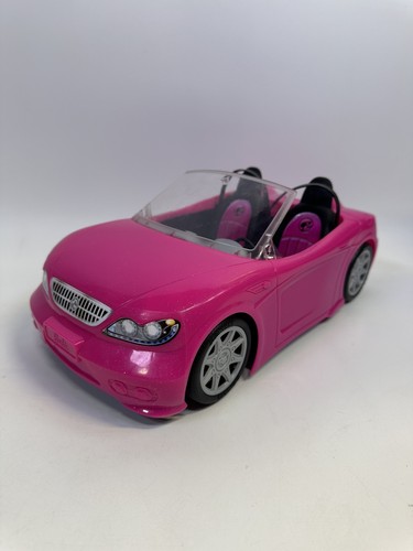 Barbie pink convertible car - barbie,