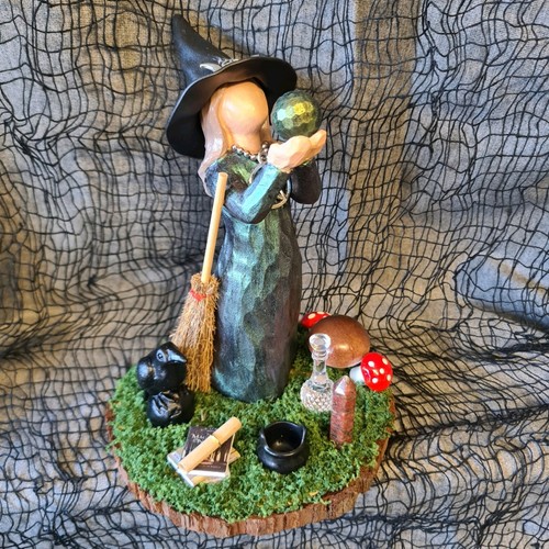 Ceramic witch holding ball - witch,