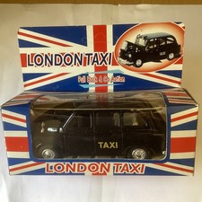 London Diecast Black Cab , Bonnet & Doors Open And Pull and Let Go Drive On It.