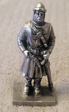 pewter figurine, likely