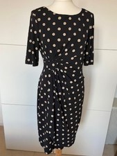 Connected apparel dress. Black with beige dots. Size 10 short sleeve knee length