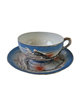 japanese dragon moriage tea cup and saucer with lithophane pensive geisha