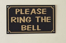 PLEASE RING THE BELL sign or