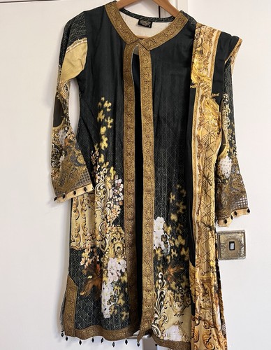 Black and gold pakistani - and,