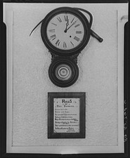 Photo:Clock and sign in tavern. Smuggler's Notch, Vermont