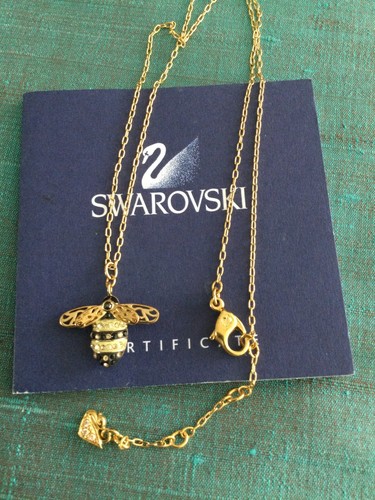 Genuine signed swarovski gold - signed,