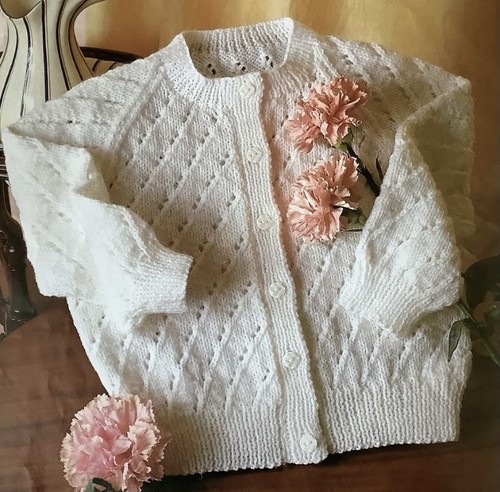 Hand knitted baby - hand,