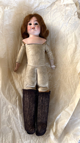 Antique bisque headed doll