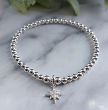 Sterling Silver Bead  Elasticated Bracelet With  North Star Charm