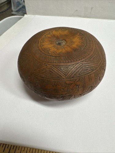 Hand carved gourd folk - hand,