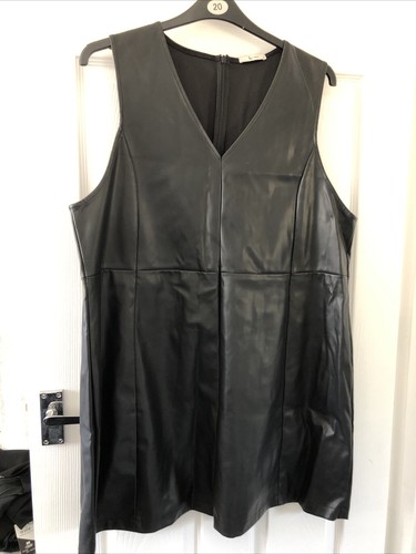 Ladies black sleeveless faux - -,