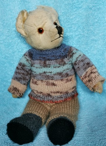 Hand knitted teddy bear