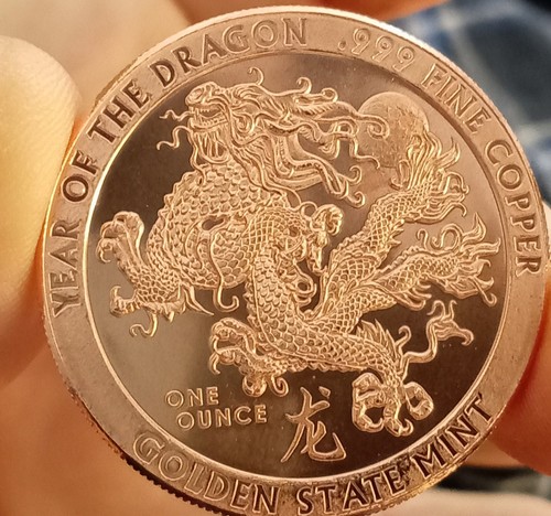 One ounce pure copper coin - ounce,