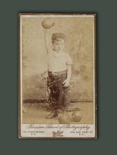 BOY lifting DUMBBELL 1880s
