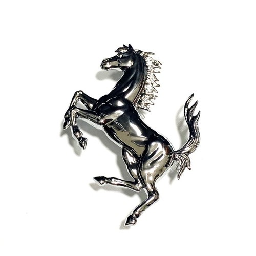 Rear emblem badge - rear,
