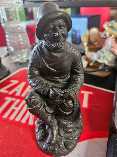 Resin figure fisherman - of, a