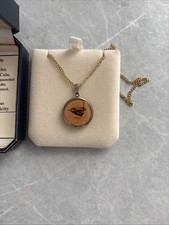 Hand-enameled coin pendant