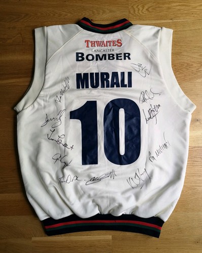 Match worn and signed muttiah - and,