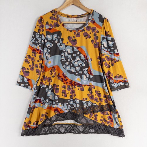 Lori goldstein logo melody top - lori,