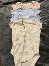 4 Short Sleeve Baby Grows. 6-9 Months Various Brands