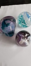 Three caithness glass paperweights. Large Pebble, Mooncrystal, Lace Tapestry.