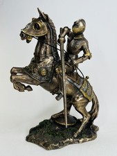 Knight in armor on horseback