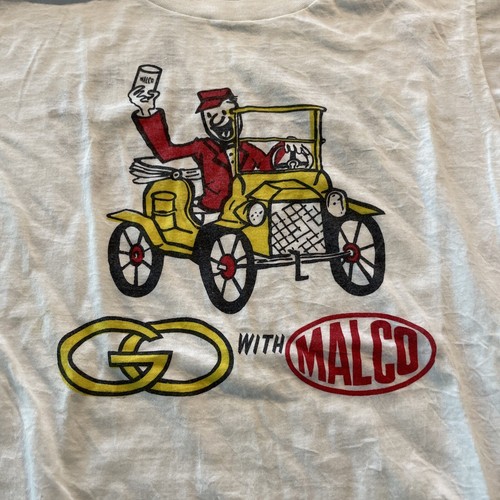 Vintage with malco oil - go,