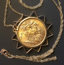 1913 Full Gold Sovereign with 9ct decorative mount and chain. 10gm