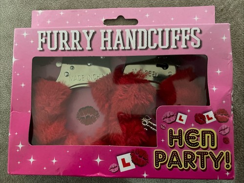 Red faux fur handcuffs with - handcuffs,