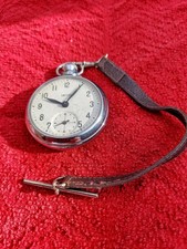 1969 Smiths Pocket Watch In Working Order. With Small Leather Strap And Fob Bar.