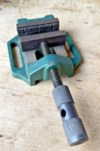 Drill press vice with hole - drill,