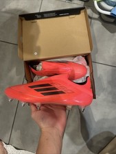 Red F50 football boots elites metal studs