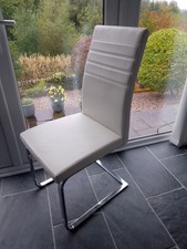 4 x Faux Leather White Cantilever Dining Chairs with Chrome Legs