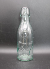Milk Bottle Glass Antique Embossed with 'MILK' and picture of a Cow being Milked