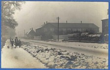 Station Road in snow, Long Buckby - old Northants RP postcard