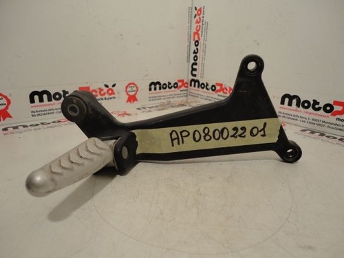 Rear right footpeg bracket - right,
