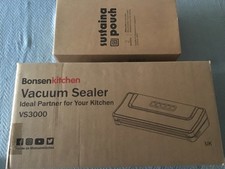 Bonsen Kitchen Vacuum Sealer with extra box of vacuum rolls.