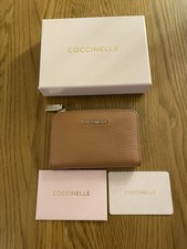 Coccinelle Metallic. Brown